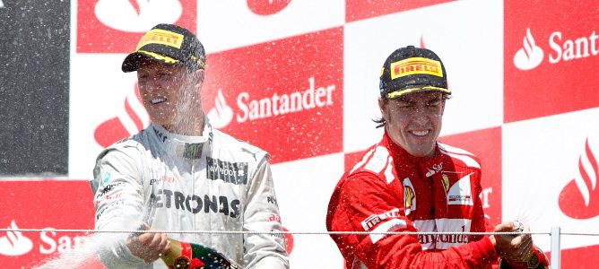 Schumacher y Alonso en el podio de Valencia