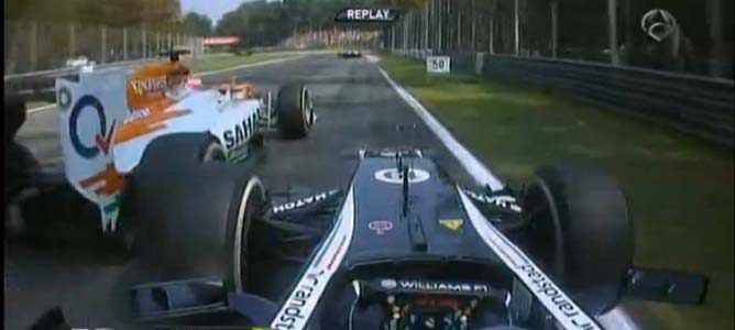 Senna intenta pasar a Di Resta en el GP de Italia