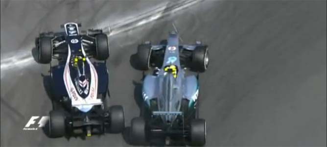 Senna intenta adelantar a Rosberg en el GP de Italia
