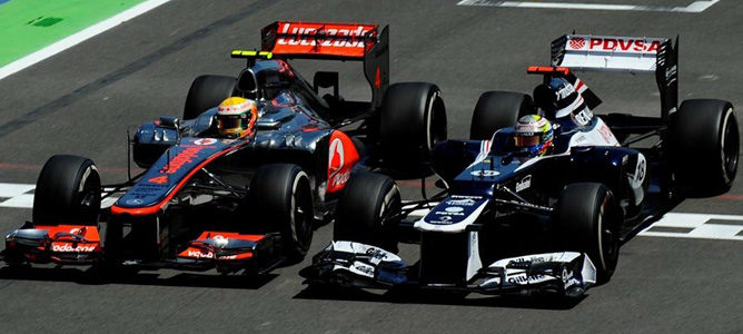 Lewis Hamilton y Pastor Maldonado en Valencia