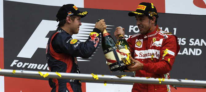 Fernando Alonso y Sebastian Vettel en el podio