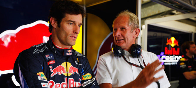 Mark Webber y Helmut Marko en el box de Red Bull