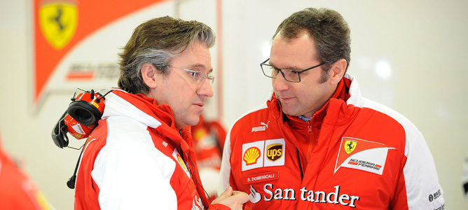 Pat Fry y Stefano Domenicali en el box de Ferrari