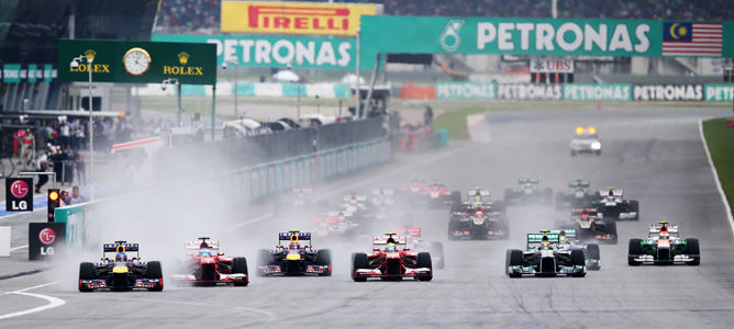 Sebastian Vettel se lleva una disputada victoria en el GP de Malasia 2013