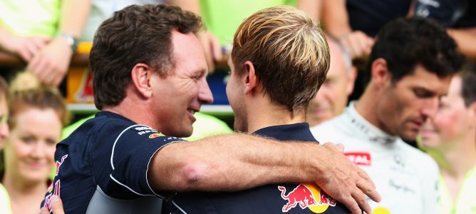 Sebastian Vettel junto a Christian Horner