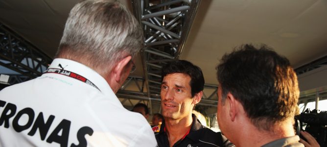 Ross Brawn habla con Mark Webber