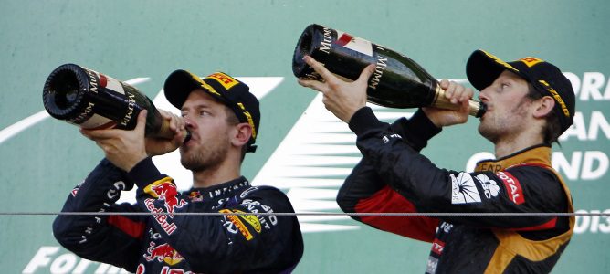 Vettel y Grosjean en el podio de Suzuka