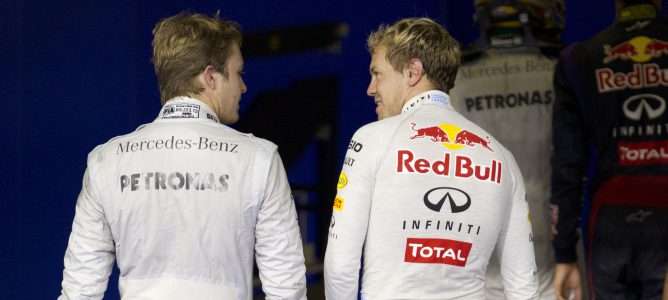 Nico Rosberg y Sebastian Vettel hablan en Abu Dabi