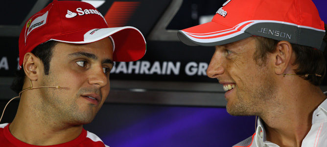 Felipe Massa y Jenson Button en una rueda de prensa