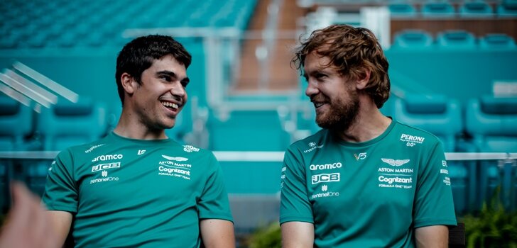 Lance Stroll charla con Vettel